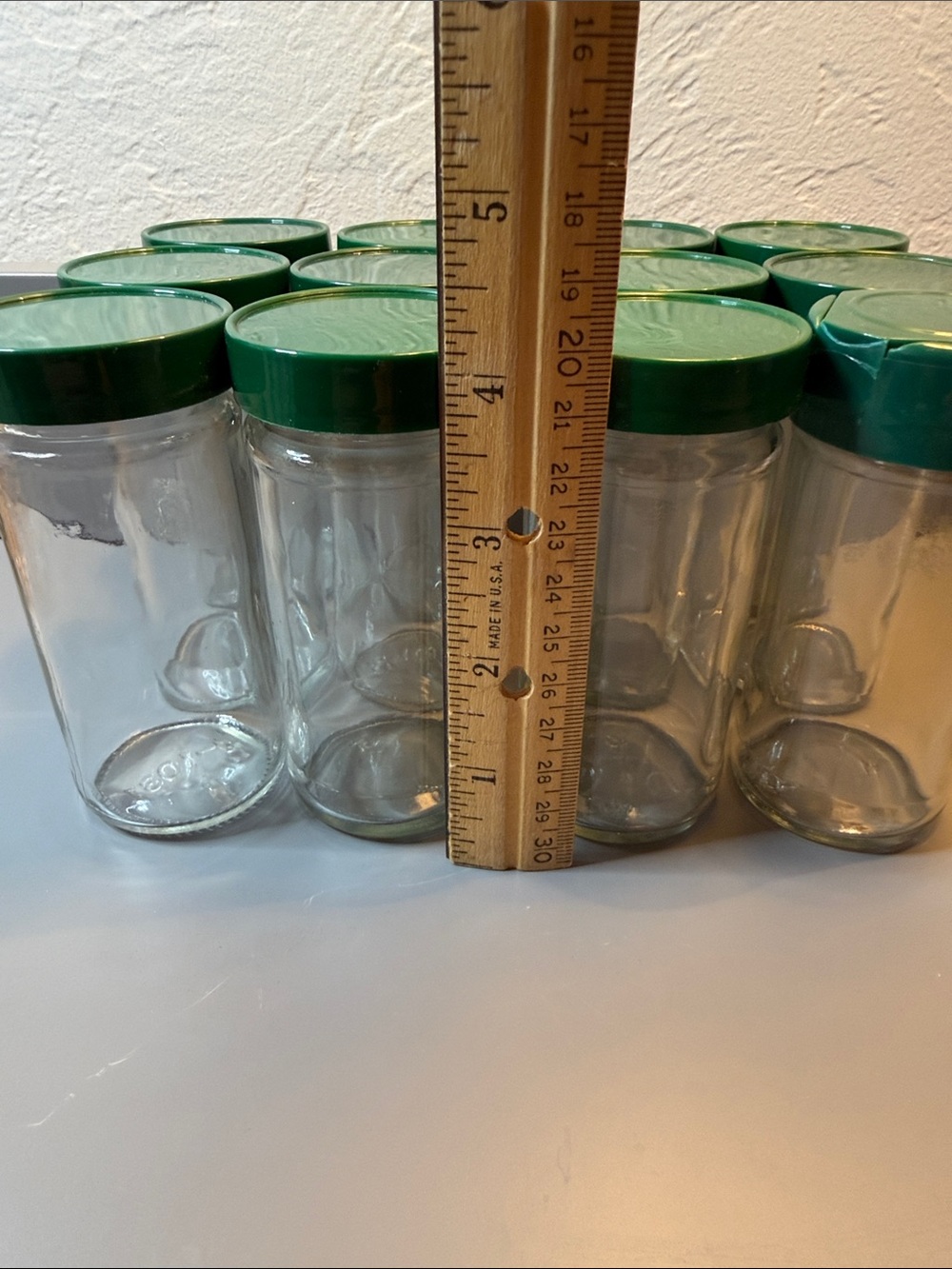 Set of 12 Vintage Glass Round Spice Jars W/ Green Lids, Approximately 4.5” Tall - Picture 3 of 8